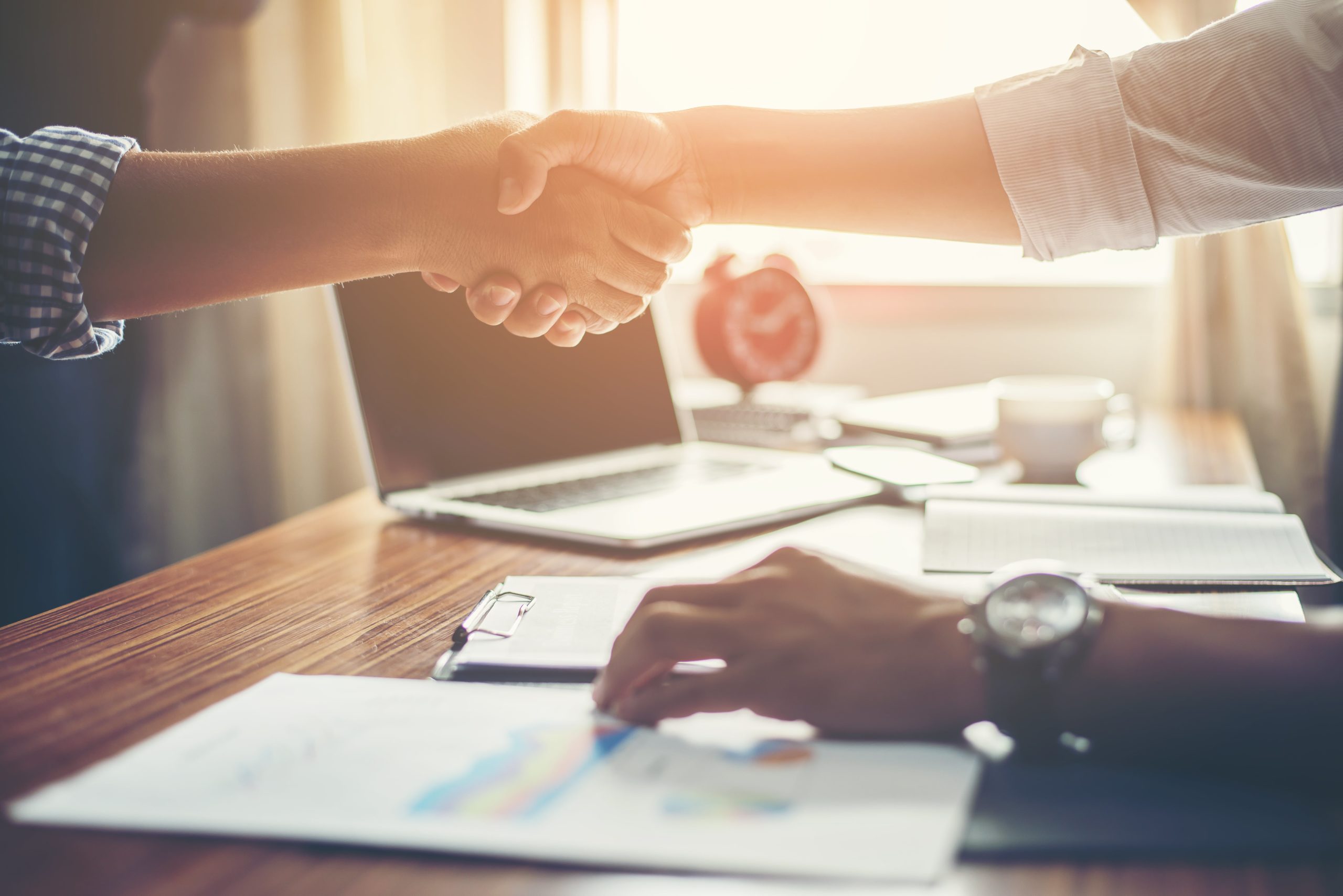business-people-handshake-greeting-deal-at-work-min